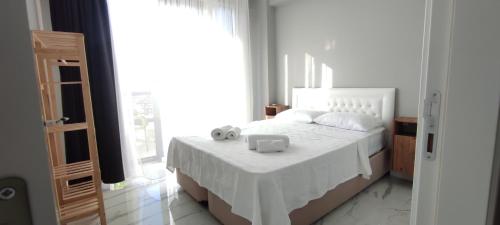 Ένα ή περισσότερα κρεβάτια σε δωμάτιο στο ıhlamur junior 2