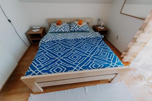 Кровать или кровати в номере Apartman Tea i Studio apartman Toni