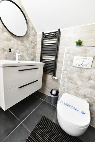 Ένα μπάνιο στο Apartmani Brium