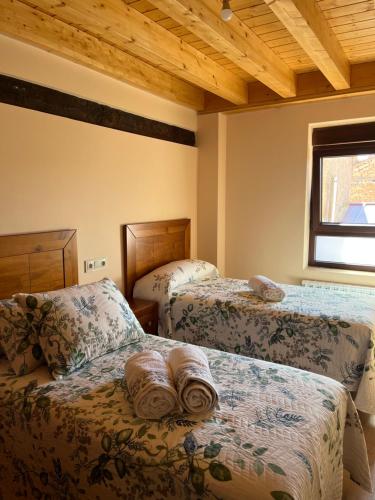Säng eller sängar i ett rum på Casa Marite Vivienda de uso turístico