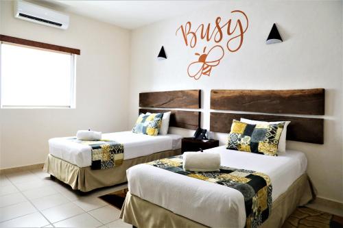 Postel nebo postele na pokoji v ubytování Hotel 12 BEES by Kavia