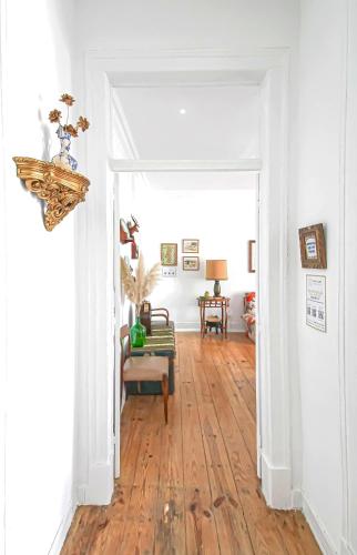 a room with a hallway with a wooden floor at Donapart in Lisbon
