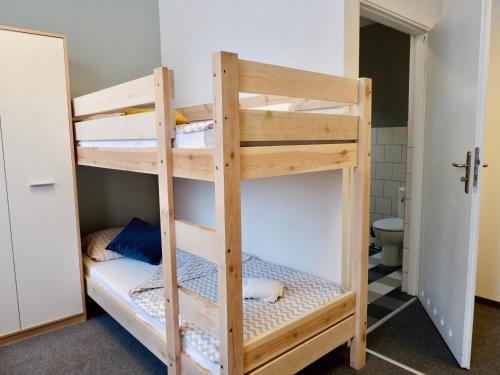 Cama o camas de una habitación en Moon Hostel Gdańsk