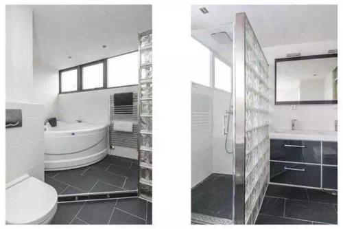 e bagno con vasca, servizi igienici e lavandino. di Cozy Dutchie House Near Utrecht a Nieuwegein