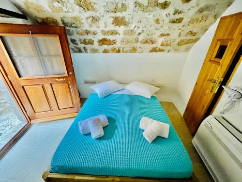 A bed or beds in a room at Vecchia Casa sterna