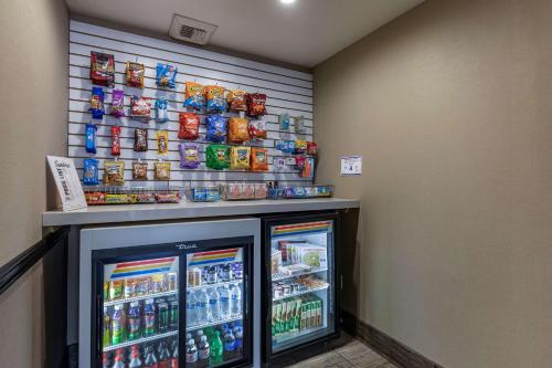 a convenience store with two refrigerators and drinks at Best Western Plus Las Vegas West in Las Vegas