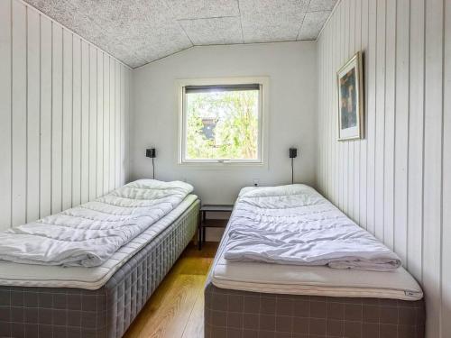 Cama o camas de una habitación en Holiday home Rødby LIV