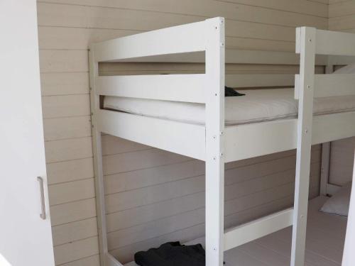 a couple of bunk beds in a room at 6 person holiday home in SÄFFLE-By Traum in Säffle