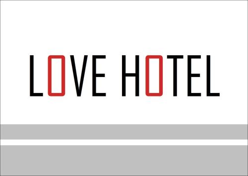 a sign with the words love hotel in black and red at Hotel Liberty Matsuyama (Adult Only) in Matsuyama