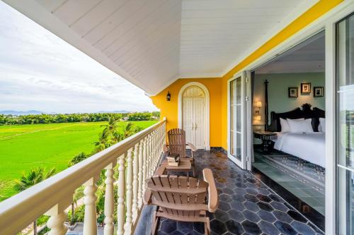 A balcony or terrace at La Siesta Hoi An Resort & Spa
