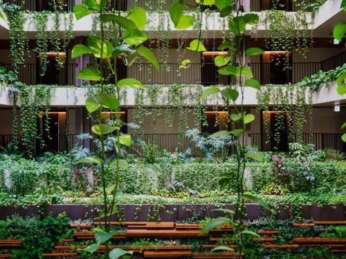 a garden on the side of a building at MB GALLERY CHATAN by THE TERRACE HOTELS in Chatan