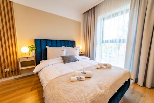 Katil atau katil-katil dalam bilik di Apartamenty w Zatoce