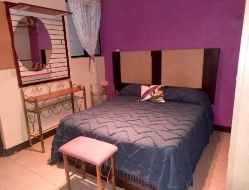 Ένα ή περισσότερα κρεβάτια σε δωμάτιο στο La Terraza del Pochote