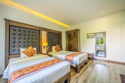 Katil atau katil-katil dalam bilik di Ha Long Park Hotel