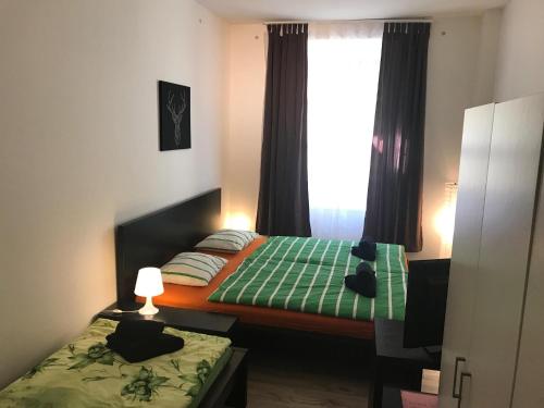 Posteľ alebo postele v izbe v ubytovaní Party bunker apartment