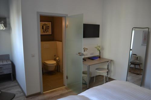 TV a/nebo společenská místnost v ubytování Boutique-Hotel "Stilvoll"