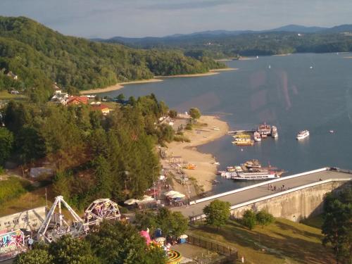 an aerial view of a river with a amusement park at Dom Wschodzącego Słońca in Solina