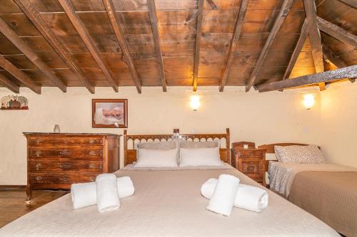A bed or beds in a room at Casa Giuliana