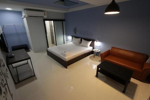 Katil atau katil-katil dalam bilik di Eazy Motel B.a.n.g.n.a