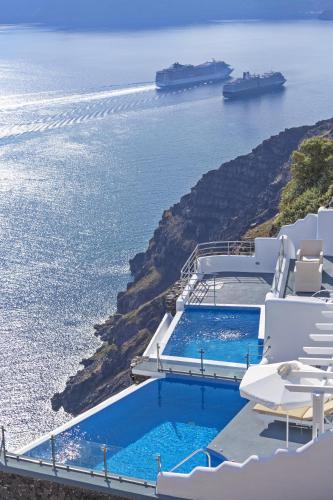 Bazén v ubytování Pegasus Suites & Spa nebo v jeho okolí