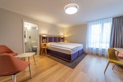 Postel nebo postele na pokoji v ubytování Dialoghotel Eckstein