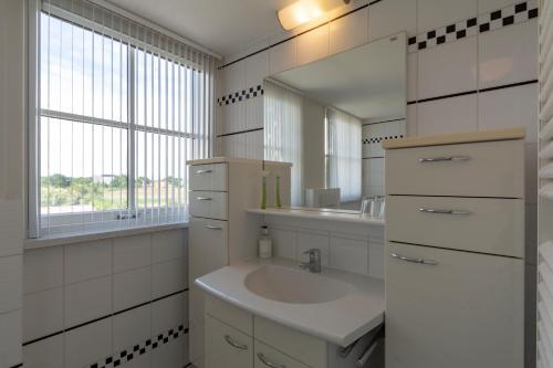 Koupelna v ubytování Buitenplaats 16 Callantsoog