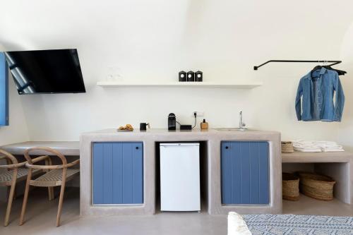 Kuchyň nebo kuchyňský kout v ubytování Acave Santorini Suites