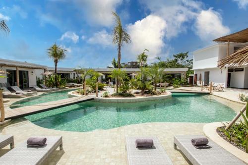 an image of a swimming pool at a resort at Kalia Bingin - Adult only in Uluwatu