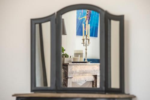 Φωτογραφία από το άλμπουμ του Suites Mana - Bleu Pacifique - Vue sur Place Ducale avec Parking privé inclus στη Σαρλβίλ-Μεζιέρ