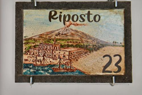 a sign with a picture of a cruise ship at San Anton Hotel in Trecastagni