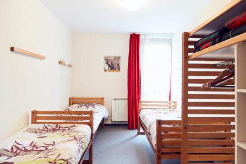Легло или легла в стая в Maison de 2 chambres avec jardin amenage et wifi a La Chapelle Geneste