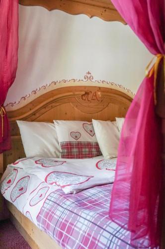 Postel nebo postele na pokoji v ubytování Hotel Alba Wellness & Spa