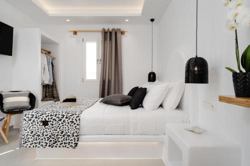 Postel nebo postele na pokoji v ubytování Naxos Maes Studios