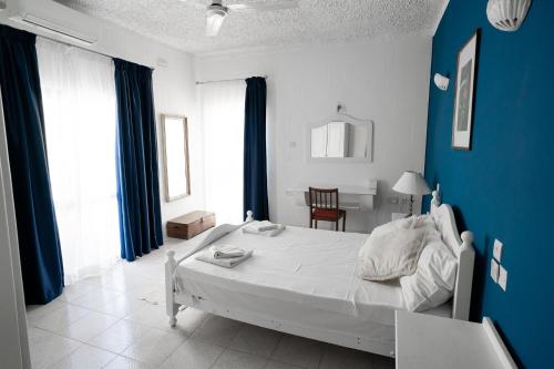Una cama o camas en una habitación de Satori Gozo Centre - Villa Ibo