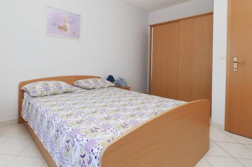 Postel nebo postele na pokoji v ubytování Vila Rikard