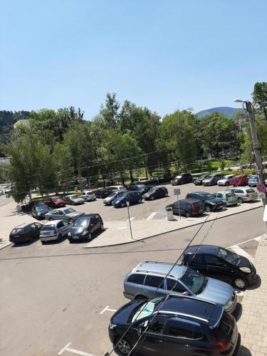 a parking lot with a lot of parked cars at The Cohen's Guest House in Kyustendil