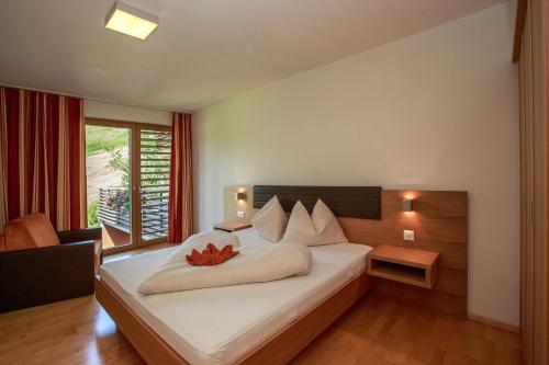 Ein Bett oder Betten in einem Zimmer der Unterkunft Apart Lischana