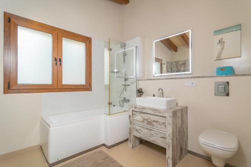 Ένα μπάνιο στο Villa Sun Club Home