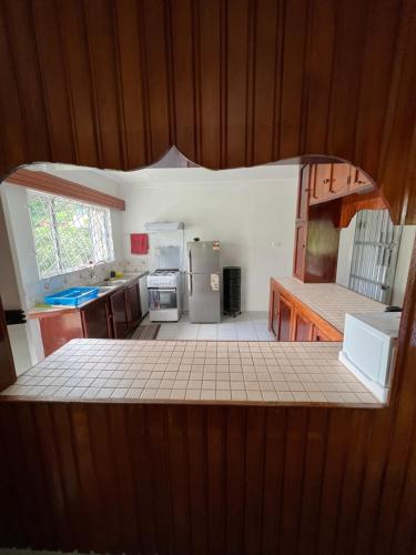 a view of a kitchen with a counter top at Hill Bottom Accommodation in Suva