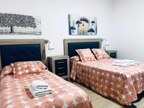מיטה או מיטות בחדר ב-Apartamento La Cueva, Artenara
