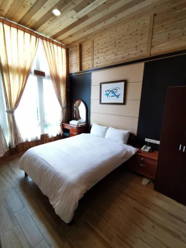 Una cama o camas en una habitación de Dreamtown