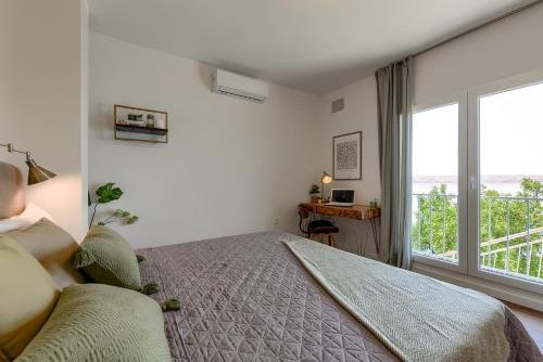 Posteľ alebo postele v izbe v ubytovaní AllSEAson House on the sea