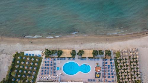 an overhead view of a beach with hotels and the ocean at Alykanas Beach Grand Hotel by Zante Plaza in Alikanas