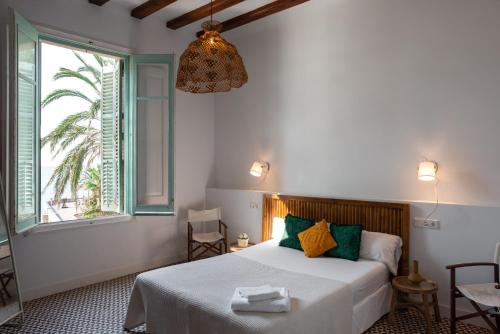 Posteľ alebo postele v izbe v ubytovaní 1840 Apartments Sitges by Suma Hotels