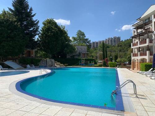 Bazén v ubytování Balchik Gardens apartments nebo v jeho okolí
