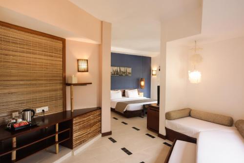 Un ou plusieurs lits dans un hébergement de l'établissement Laguna Beach Hotel & Spa