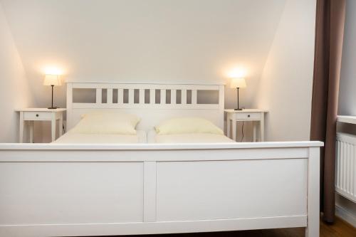 Postel nebo postele na pokoji v ubytování Großer Feldblick