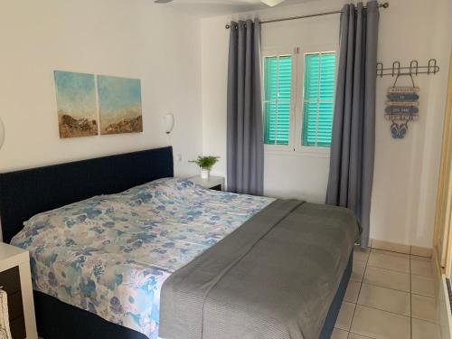 Postel nebo postele na pokoji v ubytování La Casita de la Playa 24-38