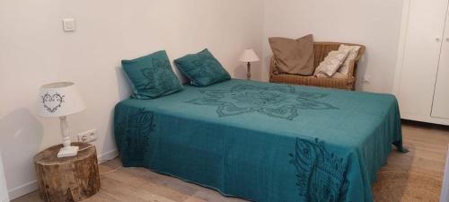 Säng eller sängar i ett rum på Le cabanon de la Citelle
