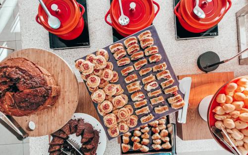 a table topped with appetizers and food on a table at ibis Rio de Janeiro Centro in Rio de Janeiro